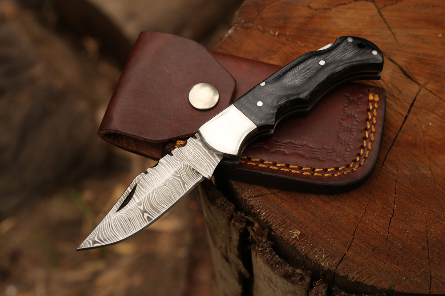 Hand-Forged Damascus Steel Folding Pocket Knife with Leather Cover – Polished Dark Wood Handle
