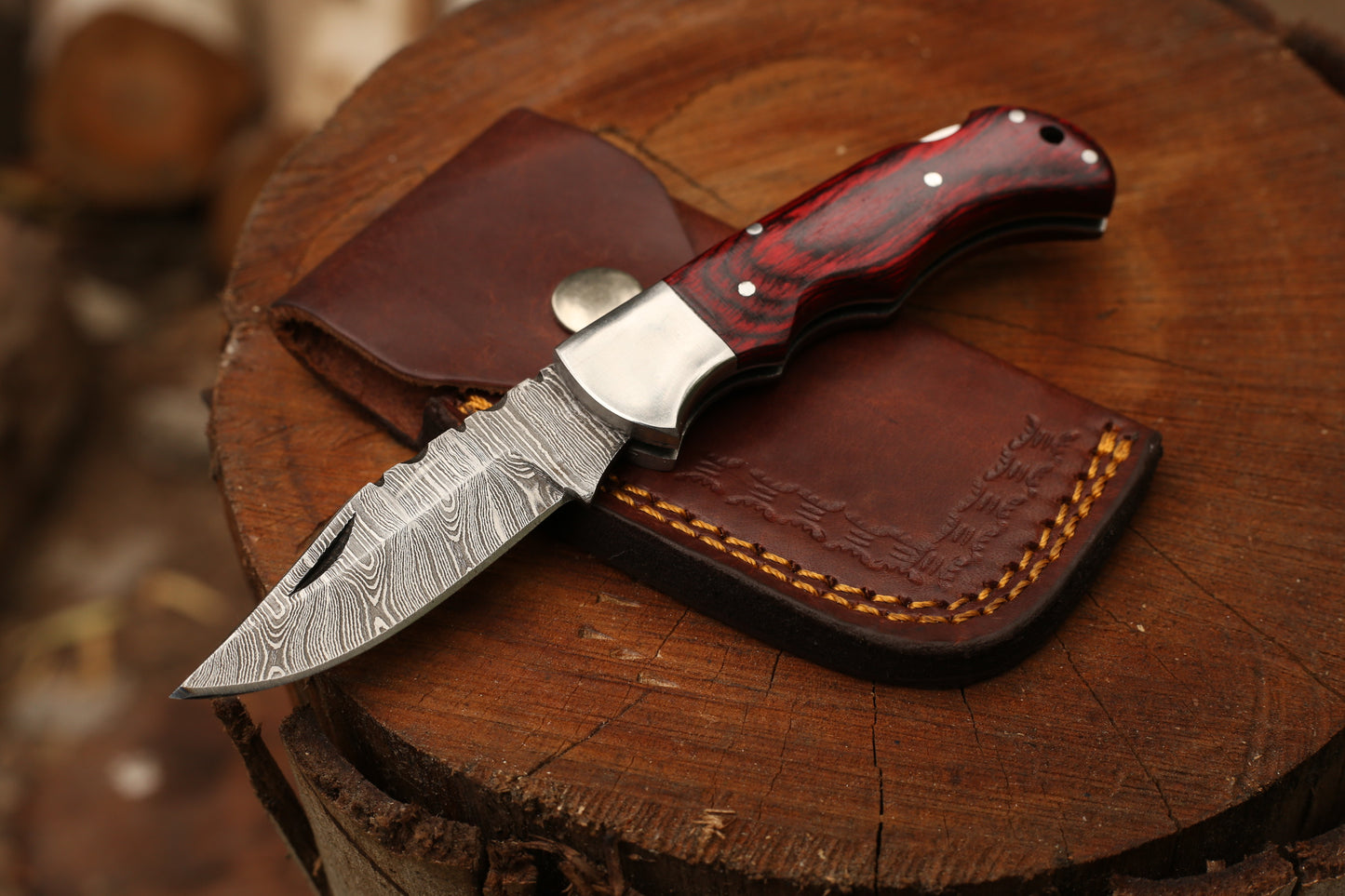 Handcrafted Damascus Steel Folding Knife with Premium Leather Cover | Crimson Pakkawood Handle