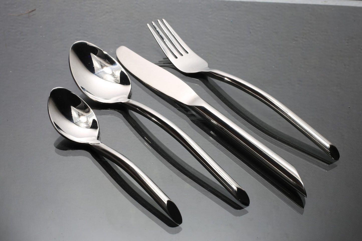 Modern 4-Piece Stainless Steel Flatware Set | Curved Handle Cutlery
