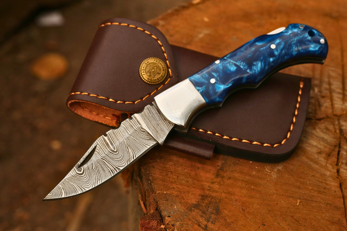 Handcrafted Damascus Steel Folding Knife – Blue Swirled Resin Handle with Leather Cover